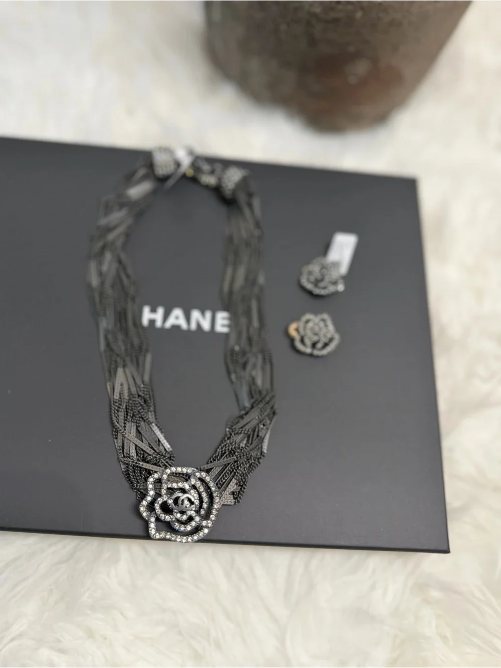 CHANEL Black Multi-Strand Necklace with Crystal Camellia Pendant and Earrings